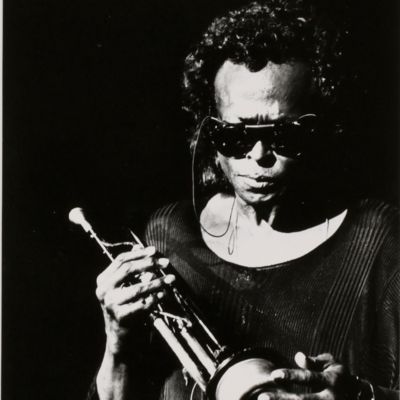 Set of 18 original photos of jazz legends, including Miles Davis, Chet Baker, Duke Ellington, and Ella Fitzgerald.