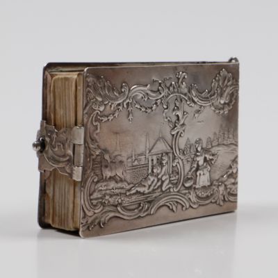 Miniature album with silver binding.